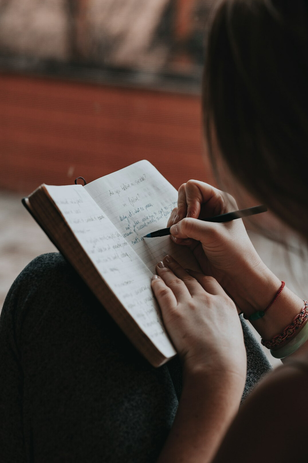 woman writing notes