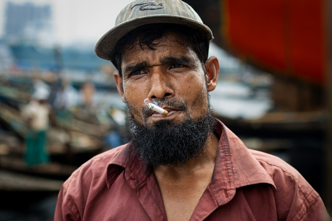 Portrait of a man with a beard looking at the camera